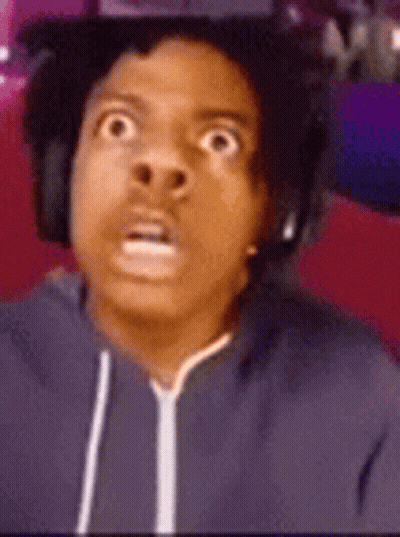 A Man Wearing Headphones And A Hoodie Is Making A Surprised Face . GIF