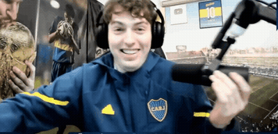A Man Wearing Headphones And A Jacket With Cabj On The Front GIF