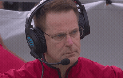 A Man Wearing Headphones And A Microphone Has A Blue Circle On The Left Ear GIF