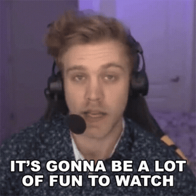 A Man Wearing Headphones And A Microphone Is Sitting In Front Of A Computer Screen . GIF