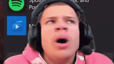 A Man Wearing Headphones And A Microphone Looks Surprised With His Mouth Open GIF