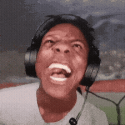 A Man Wearing Headphones And A Microphone Making A Funny Face GIF