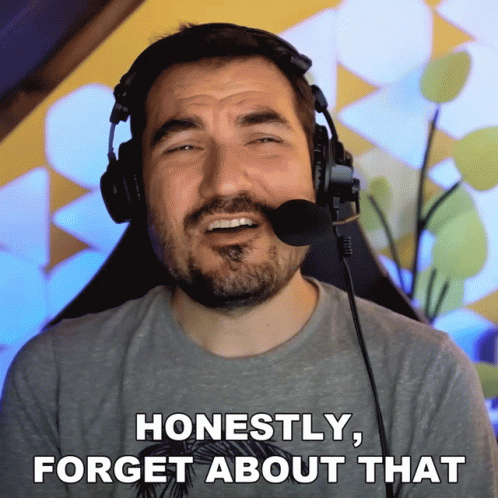 A Man Wearing Headphones And A Microphone Says Honestly Forget About That GIF