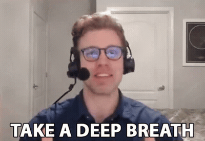 A Man Wearing Headphones And A Microphone Says Take A Deep Breath GIF