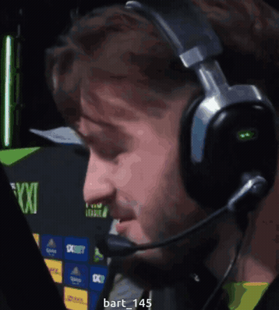 A Man Wearing Headphones And A Microphone With The Name Bart 145 On The Bottom Right GIF