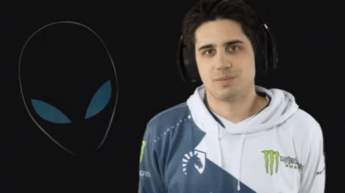 A Man Wearing Headphones And A Monster Energy Sweatshirt GIF
