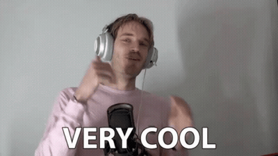 A Man Wearing Headphones And A Pink Shirt Is Giving A Thumbs Up Sign . GIF