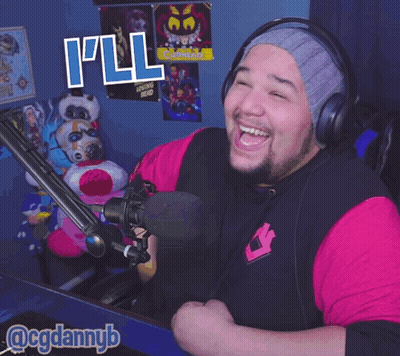 A Man Wearing Headphones And A Pink Shirt Says " I 'Ll Tell " GIF