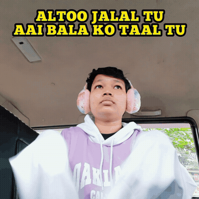 A Man Wearing Headphones And A Purple Hoodie Says Altoo Jalal Tu Aai Bala Ko Taal Tu GIF