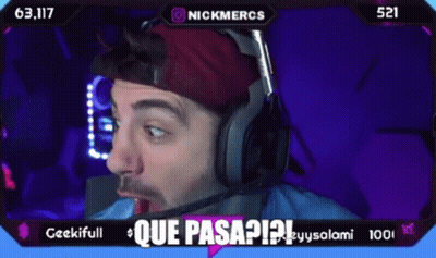 A Man Wearing Headphones And A Red Hat Says Que Pasa ? GIF