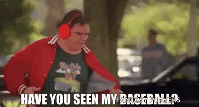 A Man Wearing Headphones And A Red Jacket Is Standing Next To A Car And Says `` Have You Seen My Fantasy Baseball ? '' GIF