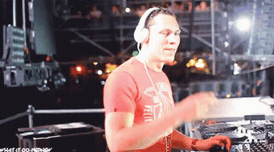 A Man Wearing Headphones And A Red Shirt That Says Yellow GIF