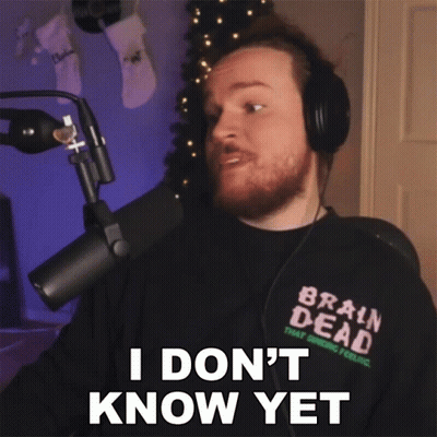 A Man Wearing Headphones And A Shirt That Says Brain Dead Says I Don 'T Know Yet GIF