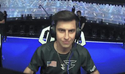 A Man Wearing Headphones And A Shirt That Says Ec On It GIF