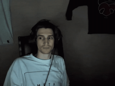 A Man Wearing Headphones And A Shirt That Says Meta On It GIF