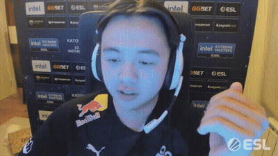 A Man Wearing Headphones And A Shirt That Says Redbull GIF