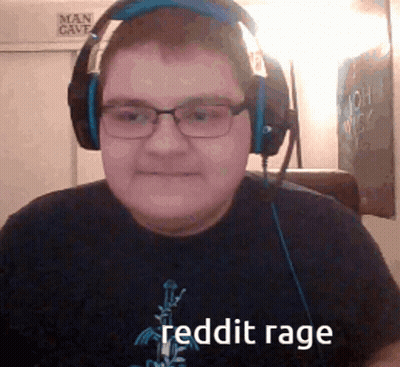 A Man Wearing Headphones And A Shirt That Says Reddit Rage On It GIF