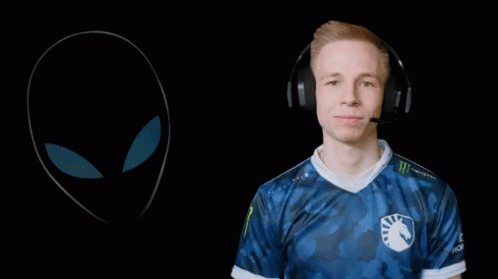 A Man Wearing Headphones And A Shirt That Says Team Liquid GIF