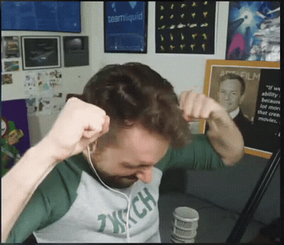 A Man Wearing Headphones And A Shirt That Says Tech On It GIF