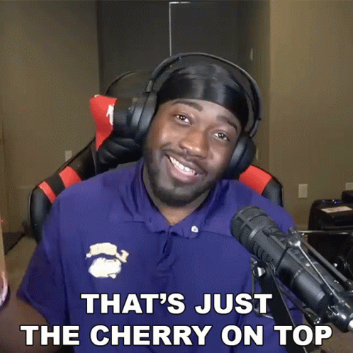 A Man Wearing Headphones And A Shirt That Says That 'S Just The Cherry On Top GIF