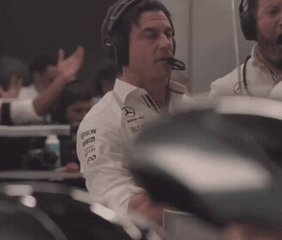 A Man Wearing Headphones And A Shirt With Epson Written On It GIF