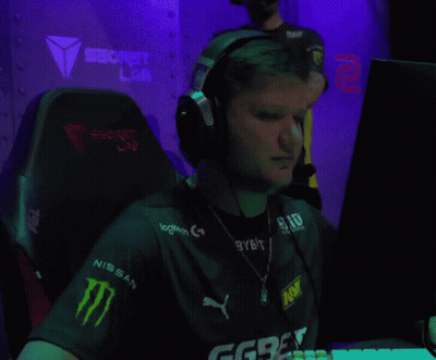 A Man Wearing Headphones And A Shirt With Logitech On It GIF