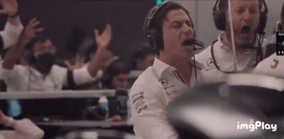 A Man Wearing Headphones And A Shirt With Mercedes Written On It GIF
