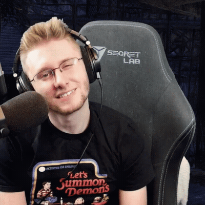 A Man Wearing Headphones And A T-Shirt That Says Let 'S Summon Demons GIF