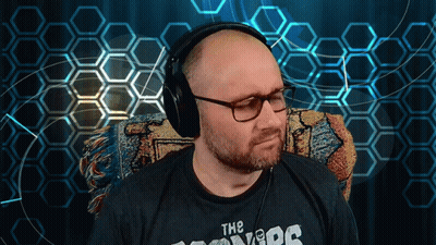 A Man Wearing Headphones And A T-Shirt That Says " The Covers " GIF