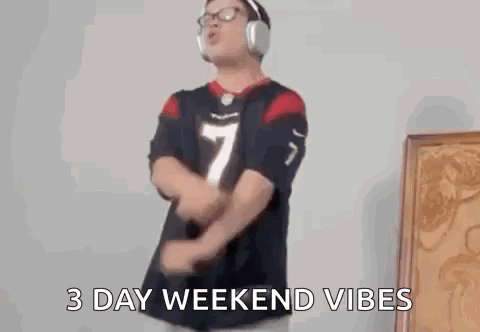 A Man Wearing Headphones And A Texans Jersey Is Dancing In A Room . GIF
