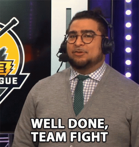 A Man Wearing Headphones And A Tie Says Well Done Team Fight GIF