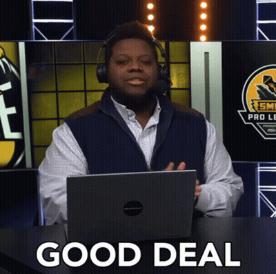 A Man Wearing Headphones And A Vest Is Sitting In Front Of A Laptop With The Words Good Deal Written On It GIF