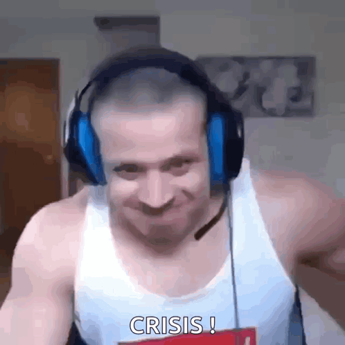 A Man Wearing Headphones And A White Tank Top Is Making A Funny Face And Saying Crisis . GIF