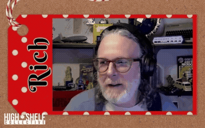 A Man Wearing Headphones And Glasses Is Behind A Red Tag That Says " Rich " GIF