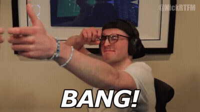A Man Wearing Headphones And Glasses Is Giving A Thumbs Up And The Word Bang Is Behind Him . GIF