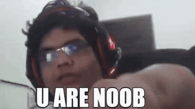 A Man Wearing Headphones And Glasses Is Pointing At The Camera With The Words `` U Are Noob '' Written On His Face . GIF