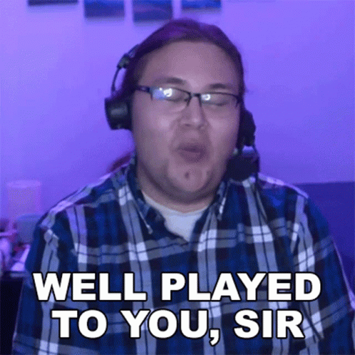 A Man Wearing Headphones And Glasses Is Saying Well Played To You Sir GIF