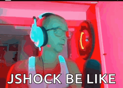 A Man Wearing Headphones And Glasses Is Standing In Front Of A Microphone And Says Jshock Be Like . GIF