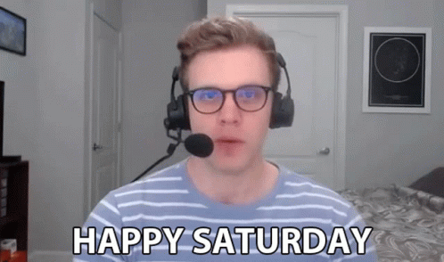 A Man Wearing Headphones And Glasses Says " Happy Saturday " GIF
