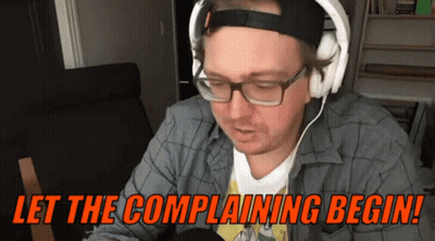 A Man Wearing Headphones And Glasses Says " Let The Complaining Begin " GIF