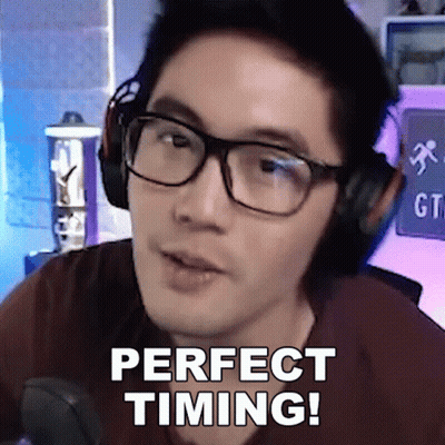 A Man Wearing Headphones And Glasses Says Perfect Timing GIF