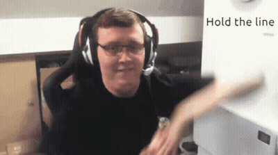 A Man Wearing Headphones And Glasses With The Words Hold The Line Behind Him GIF