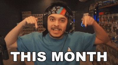 A Man Wearing Headphones Flexes His Muscles In Front Of The Words This Month GIF