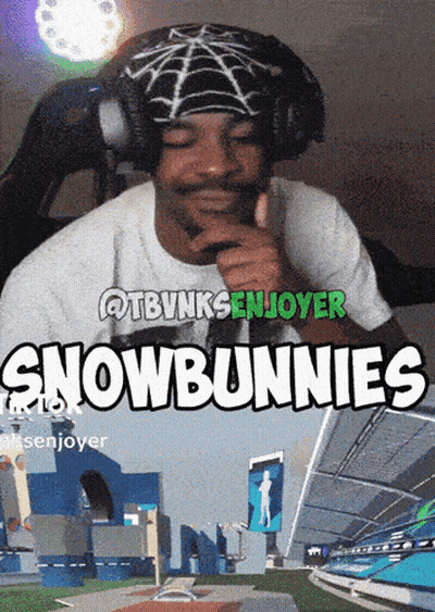 A Man Wearing Headphones Giving A Thumbs Up In Front Of A Sign That Says " Snowbunnies " GIF