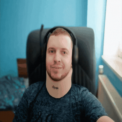 A Man Wearing Headphones Has A Tattoo On His Neck That Reads Xtreme GIF