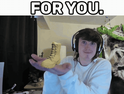 A Man Wearing Headphones Holds A Pair Of Boots In His Hand With The Words " For You " Above Him GIF