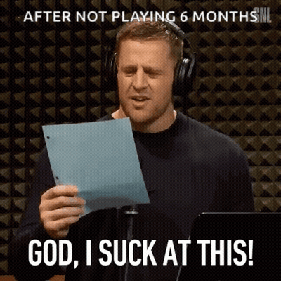 A Man Wearing Headphones Holds A Piece Of Paper In Front Of A Microphone And Says God I Suck At This GIF
