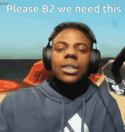 A Man Wearing Headphones Is Asking For B2 GIF