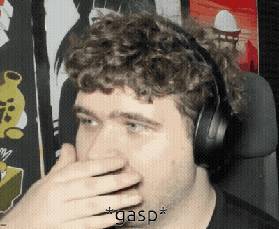 A Man Wearing Headphones Is Covering His Mouth With His Hand And Gasp Is Written Above Him GIF