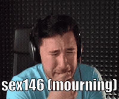 A Man Wearing Headphones Is Crying With The Words Sex146 Mourning GIF